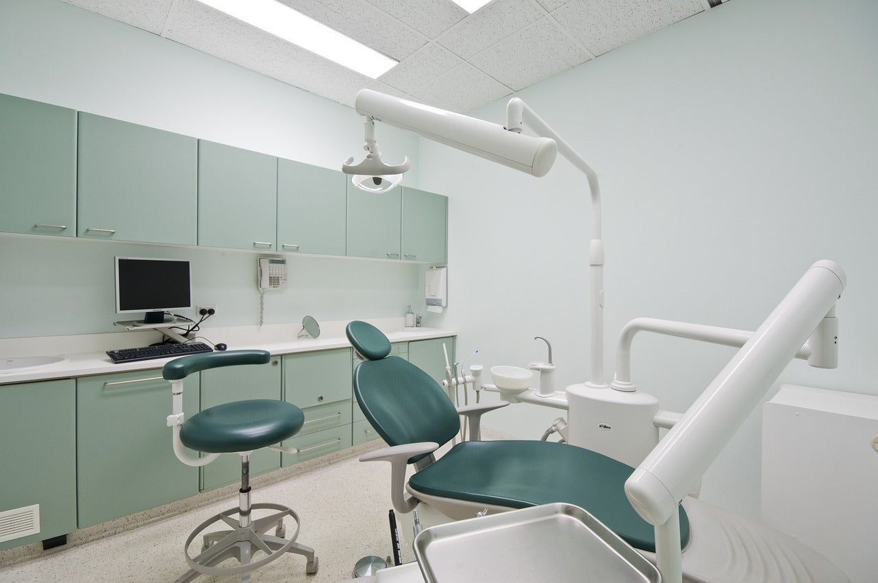 Dental chair in examining room at dental office